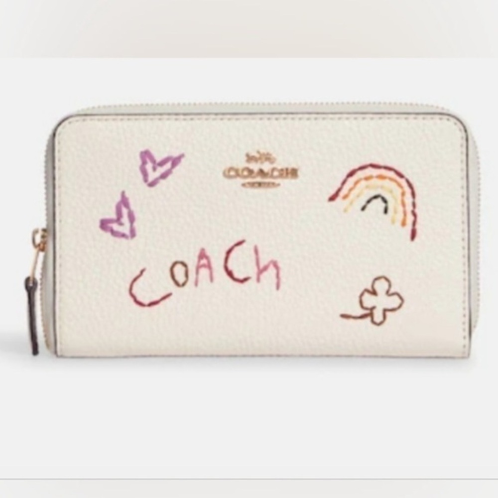 COACH Medium ID Zip Wallet
With Diary Embroidery in Gold/ Chalk